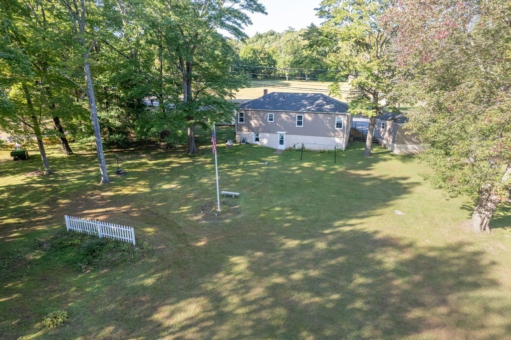 210 Belchertown Road Ware, MA 01082 - Photo 7 of 25 a backyard of a house with lots of green space