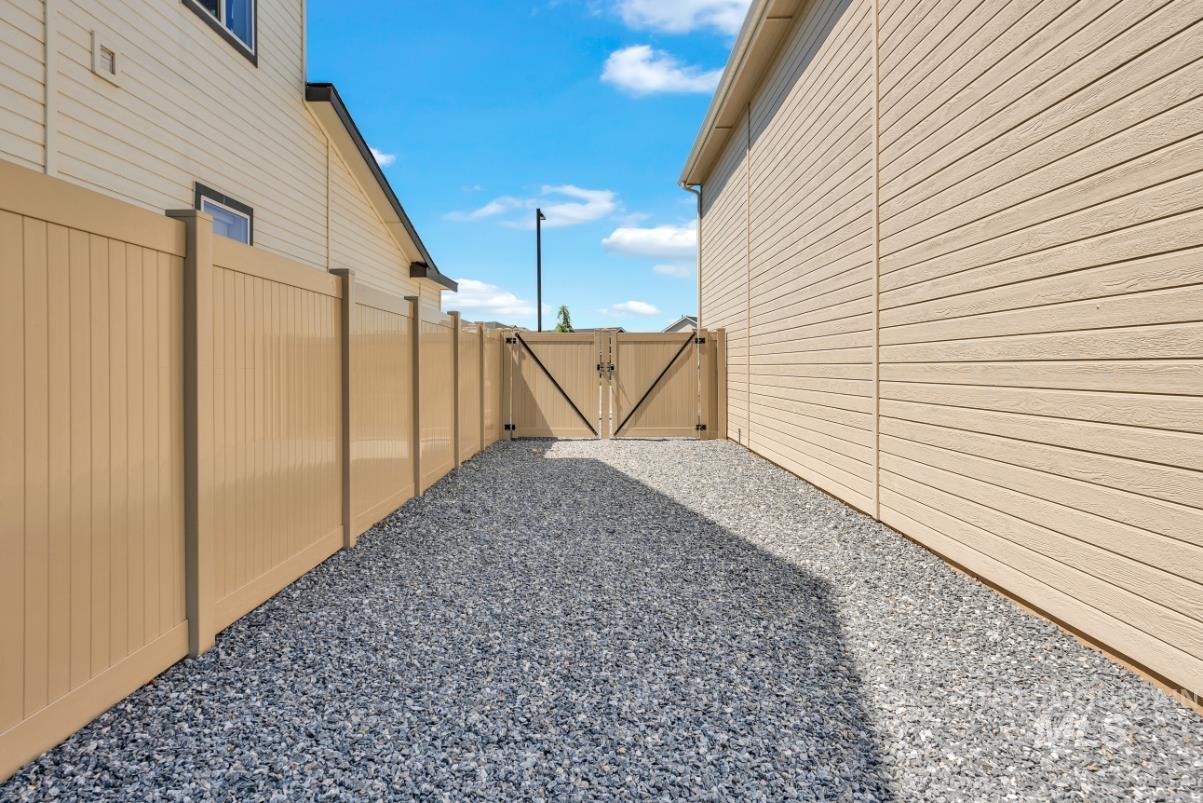 20430 Pitkin Way Caldwell, ID 83605 - Photo 19 of 23 View of yard featuring a gate