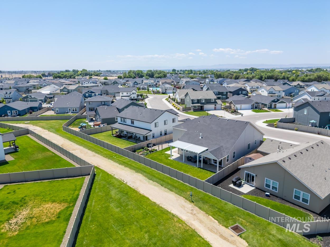 20430 Pitkin Way Caldwell, ID 83605 - Photo 2 of 23 Aerial perspective of suburban area