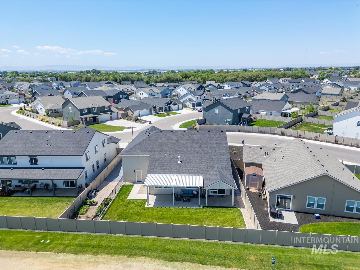 20430 Pitkin Way Caldwell, ID 83605 - Photo 21 of 23 Aerial perspective of suburban area