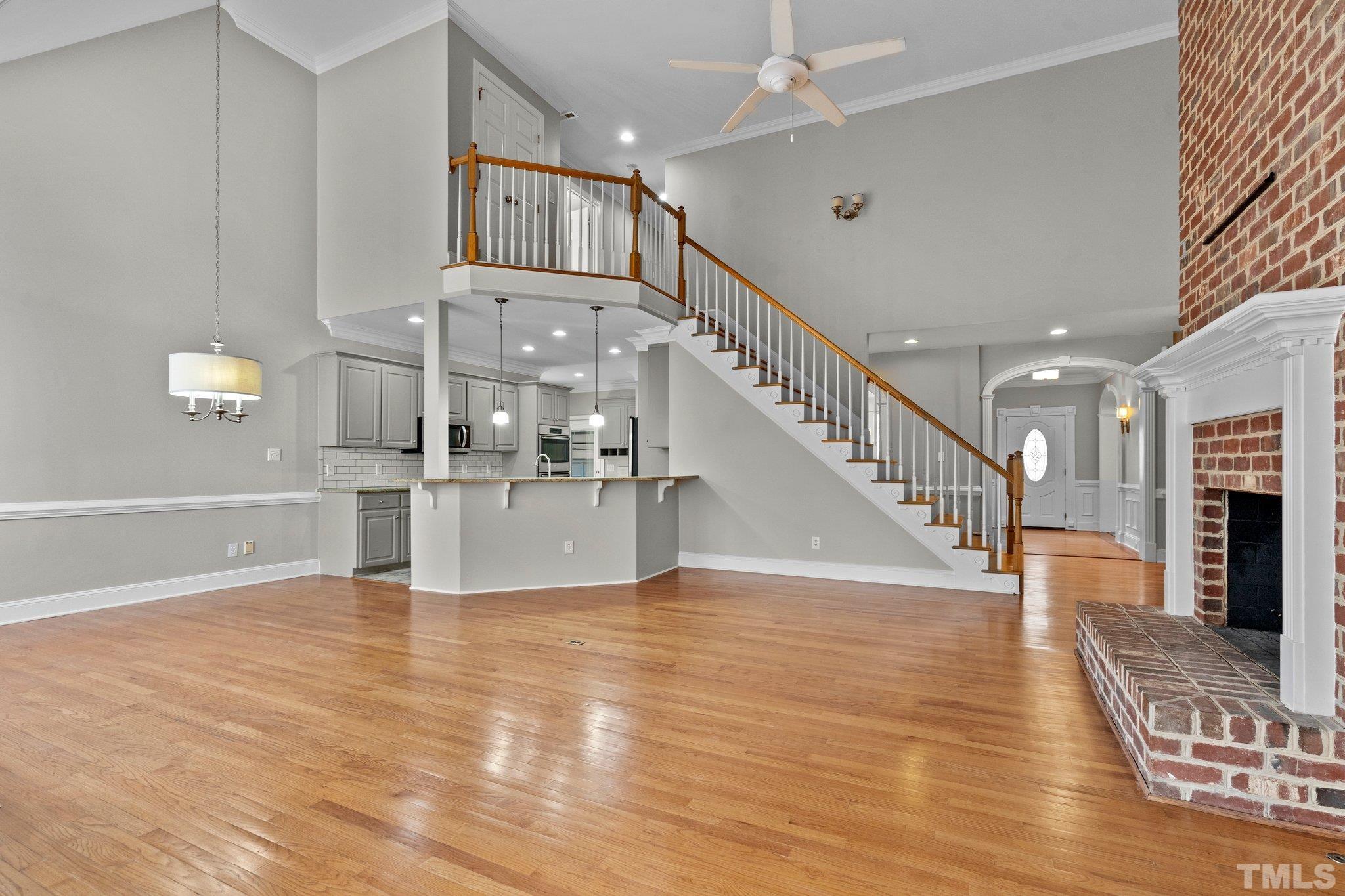 633 Pendleton Lake Road Raleigh, NC 27614 - Photo 17 of 56 a view of kitchen with cabinets and wooden floor