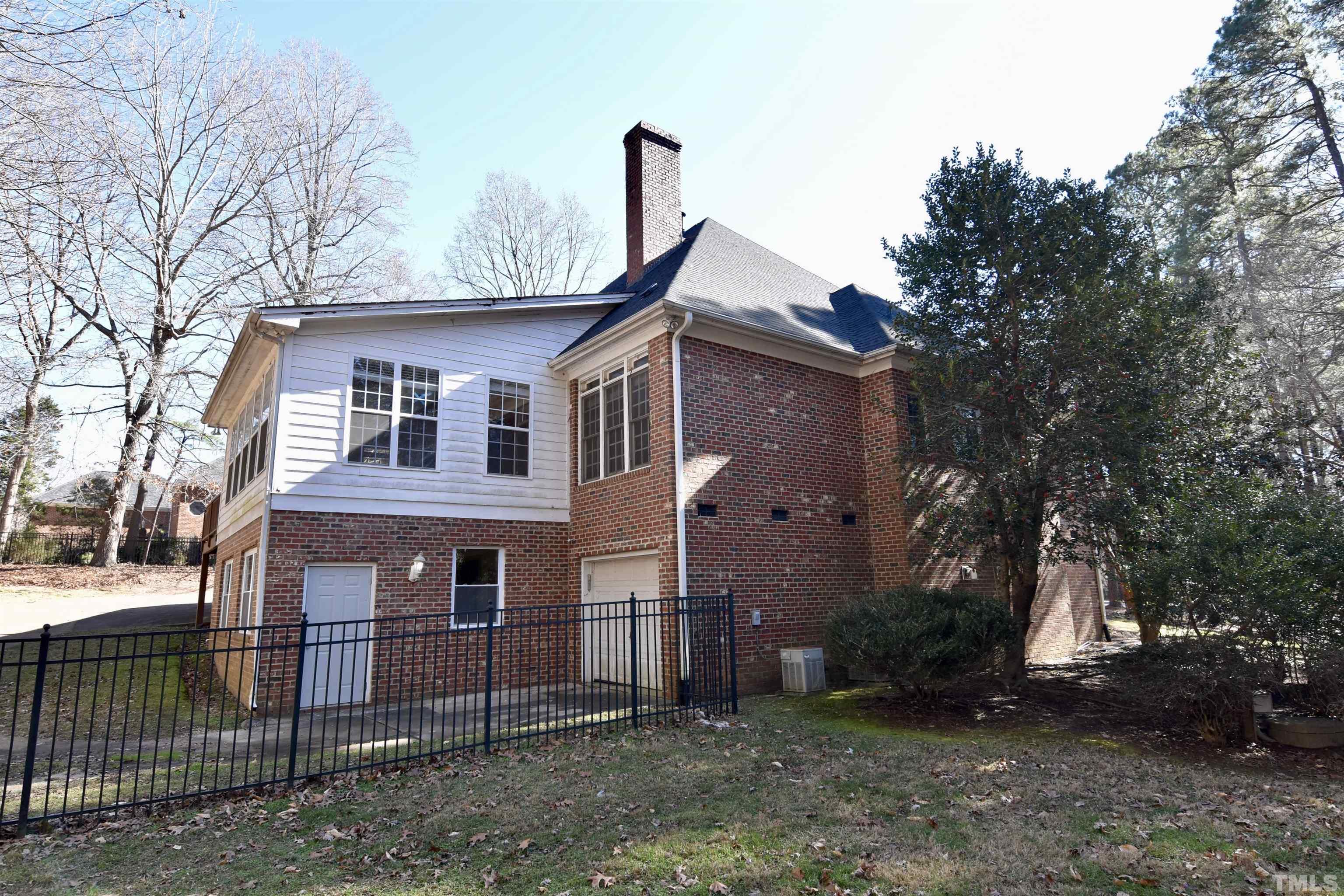 633 Pendleton Lake Road Raleigh, NC 27614 - Photo 2 of 56 a front view of a house with a garden