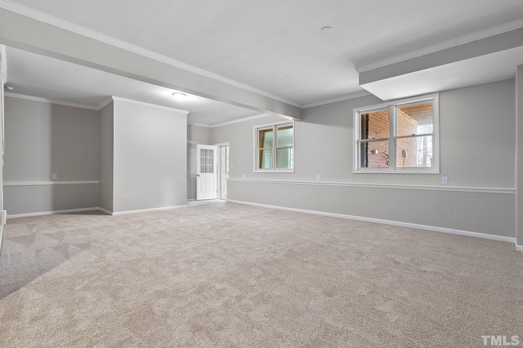 633 Pendleton Lake Road Raleigh, NC 27614 - Photo 22 of 56 an empty room with windows and closet
