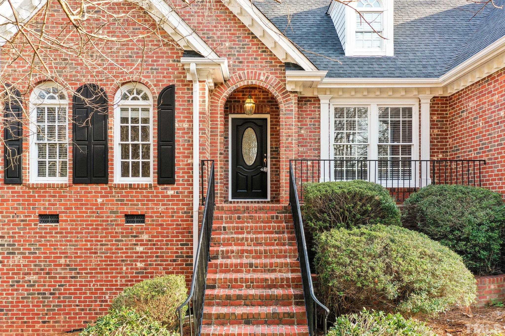 633 Pendleton Lake Road Raleigh, NC 27614 - Photo 38 of 56 a front view of a house with large windows