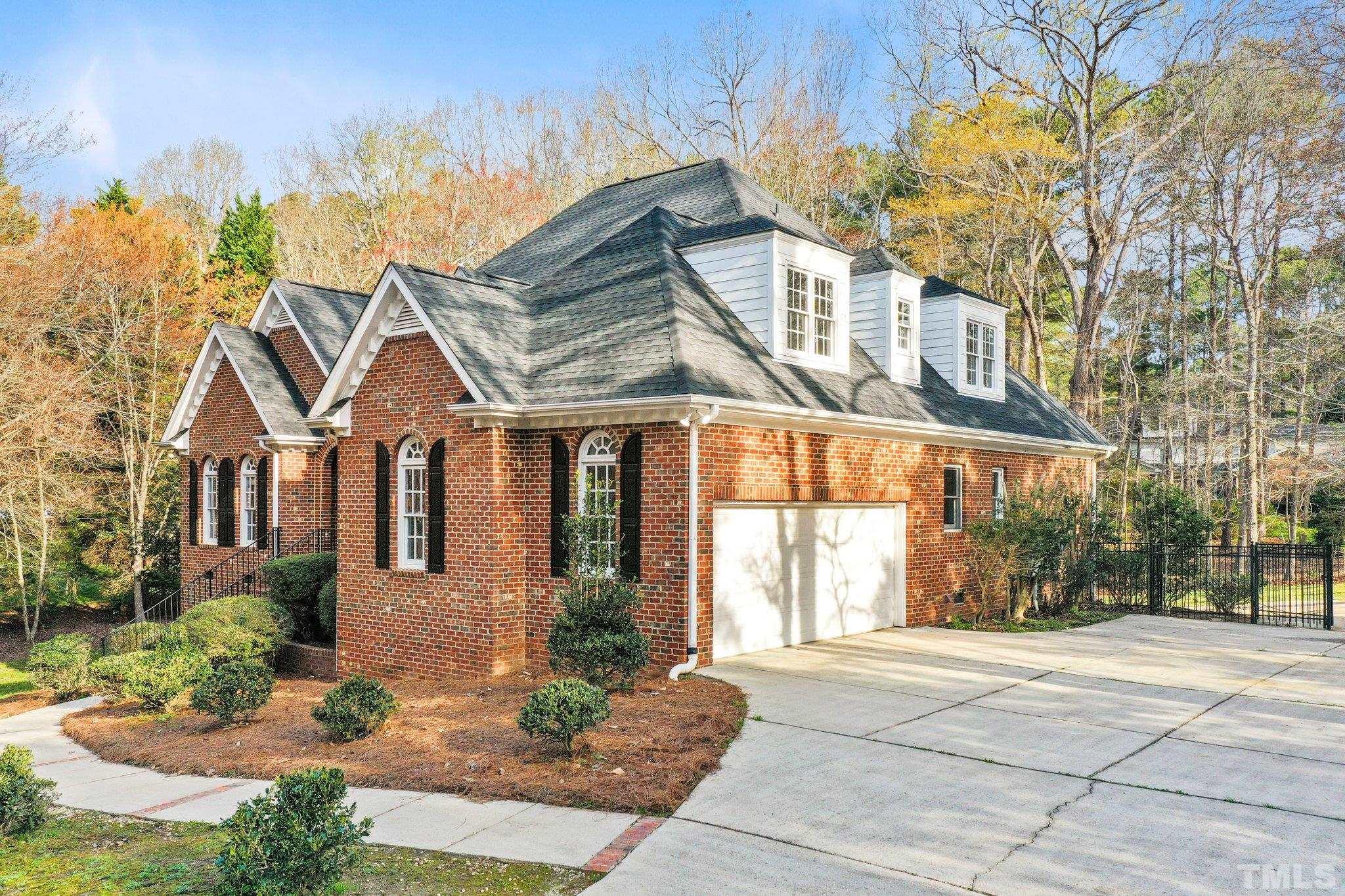 633 Pendleton Lake Road Raleigh, NC 27614 - Photo 40 of 56 a view of a white house with a outdoor space and windows