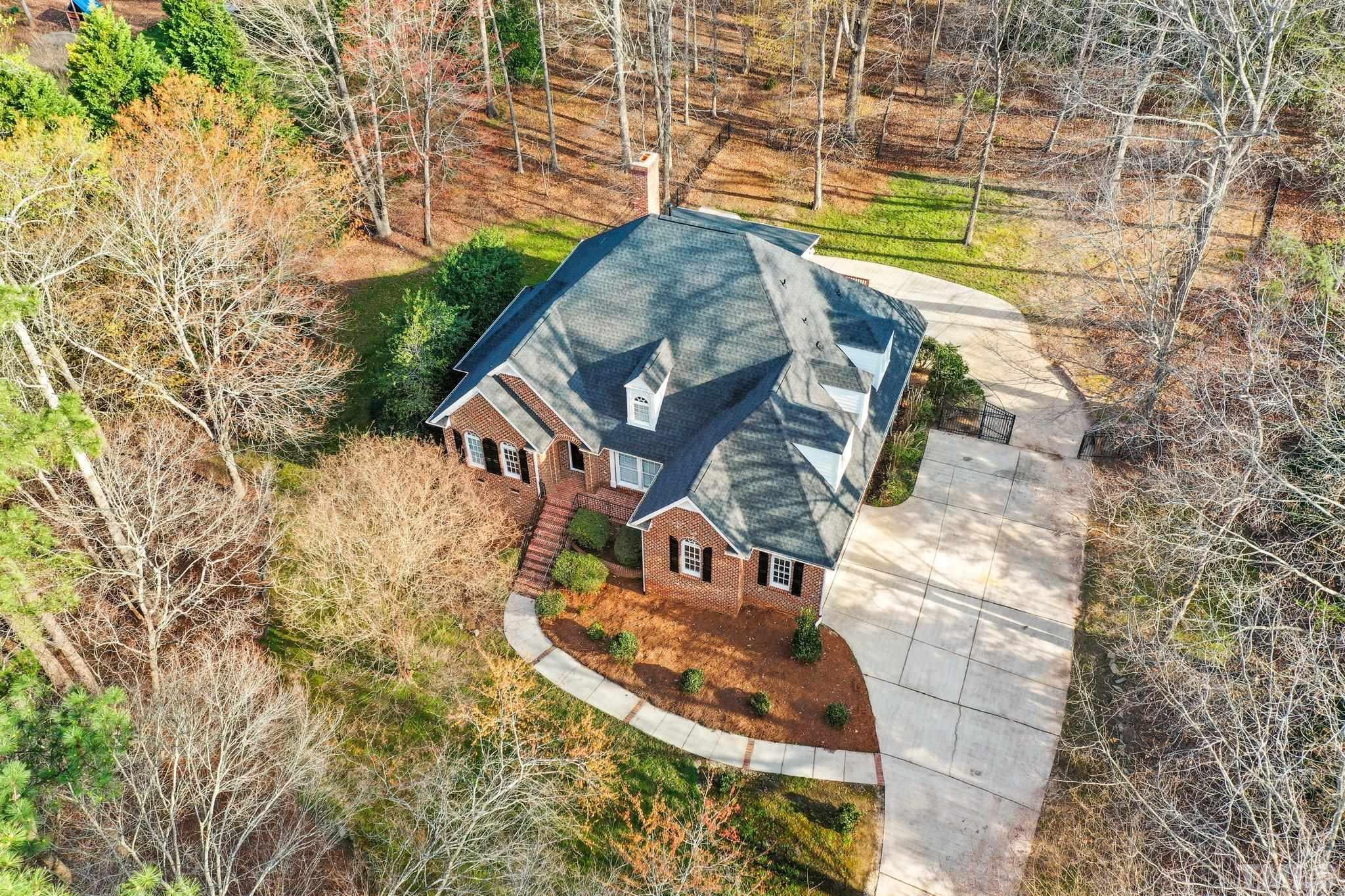 633 Pendleton Lake Road Raleigh, NC 27614 - Photo 52 of 56 a front view of a house with a yard