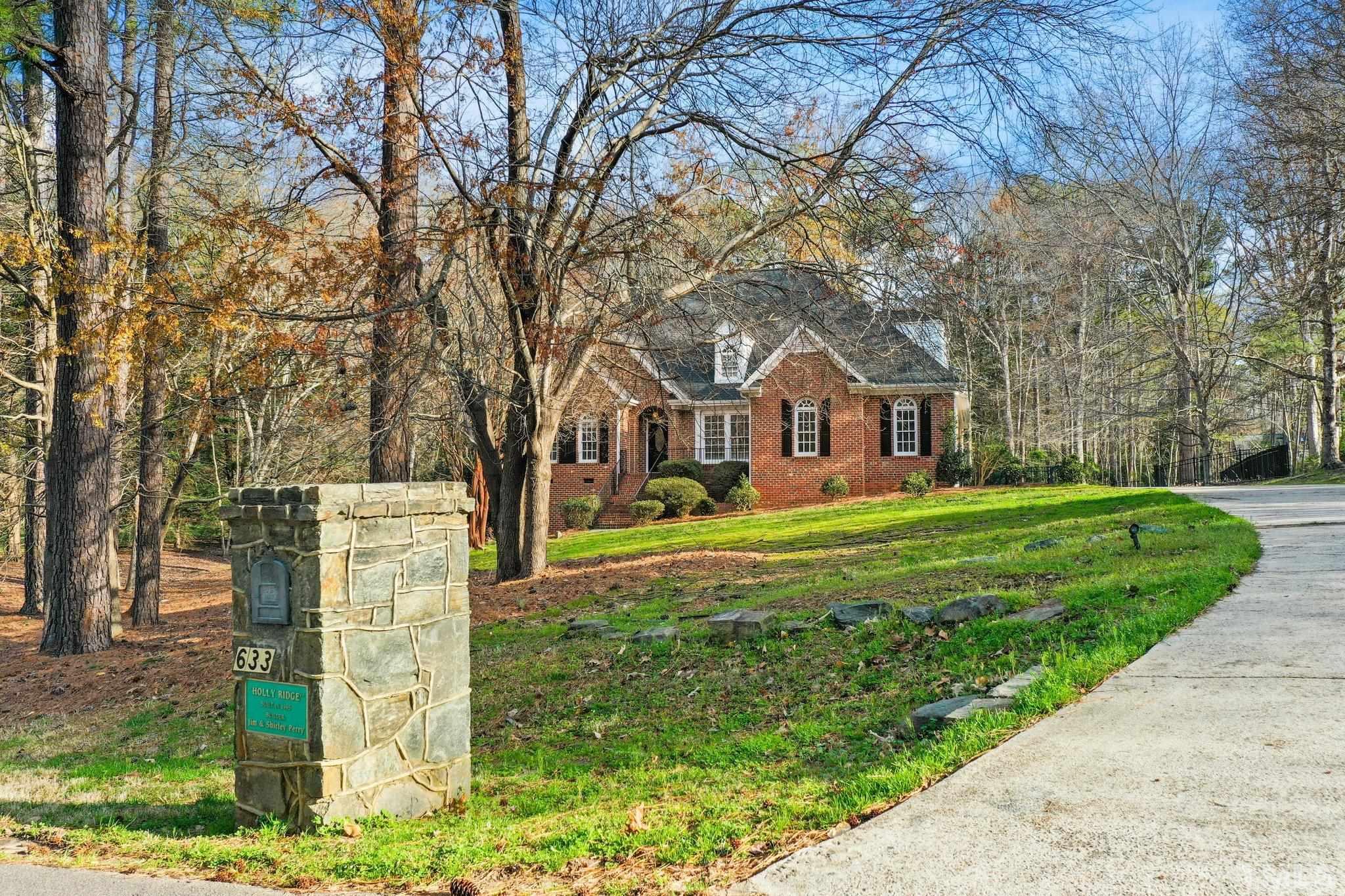 633 Pendleton Lake Road Raleigh, NC 27614 - Photo 54 of 56 a front view of a house with a yard