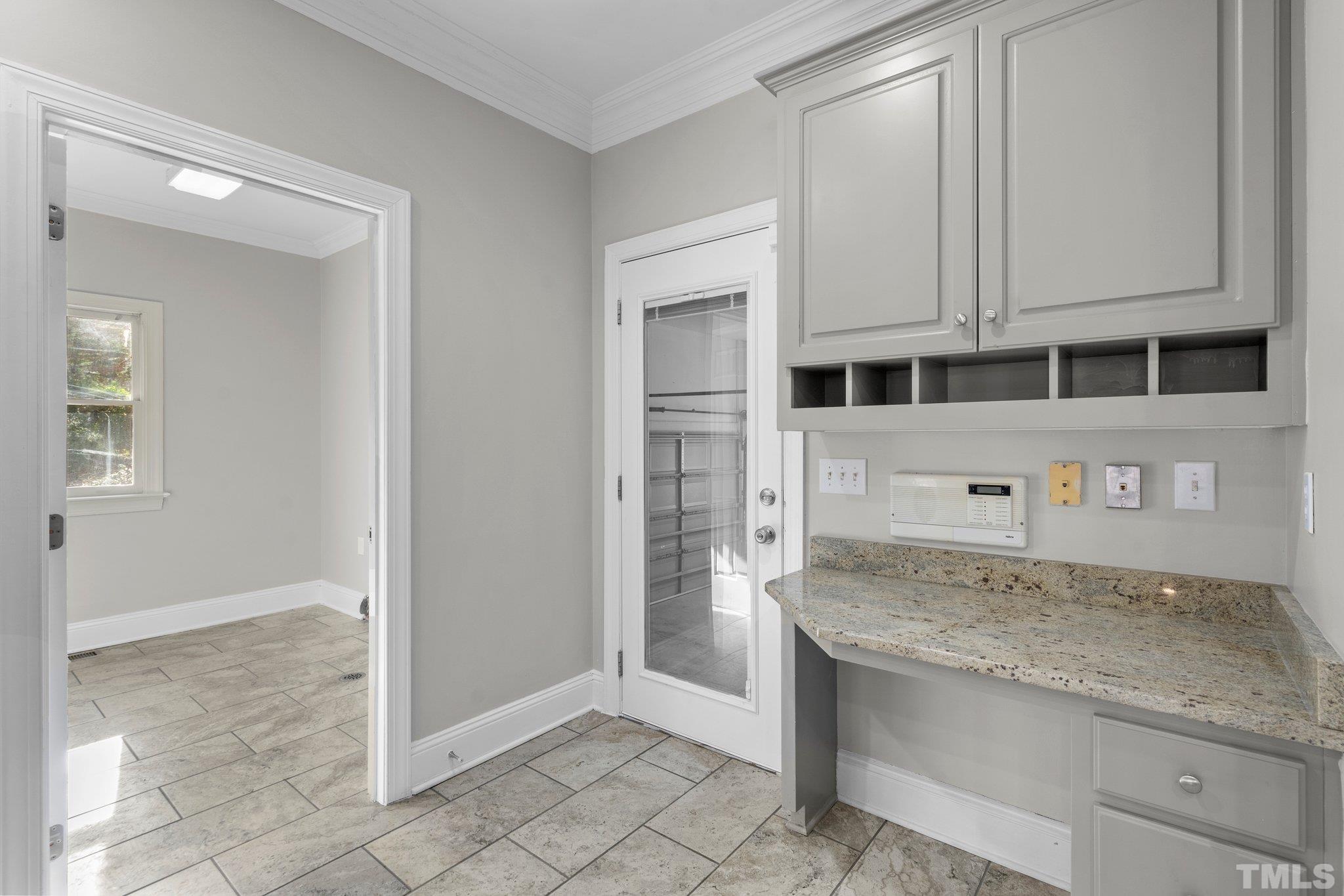 633 Pendleton Lake Road Raleigh, NC 27614 - Photo 10 of 56 a view of a kitchen with granite countertop a sink and a stove