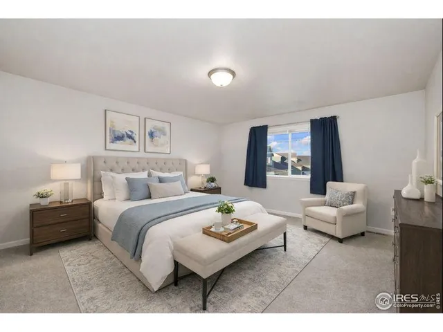 a bedroom with a bed and furniture