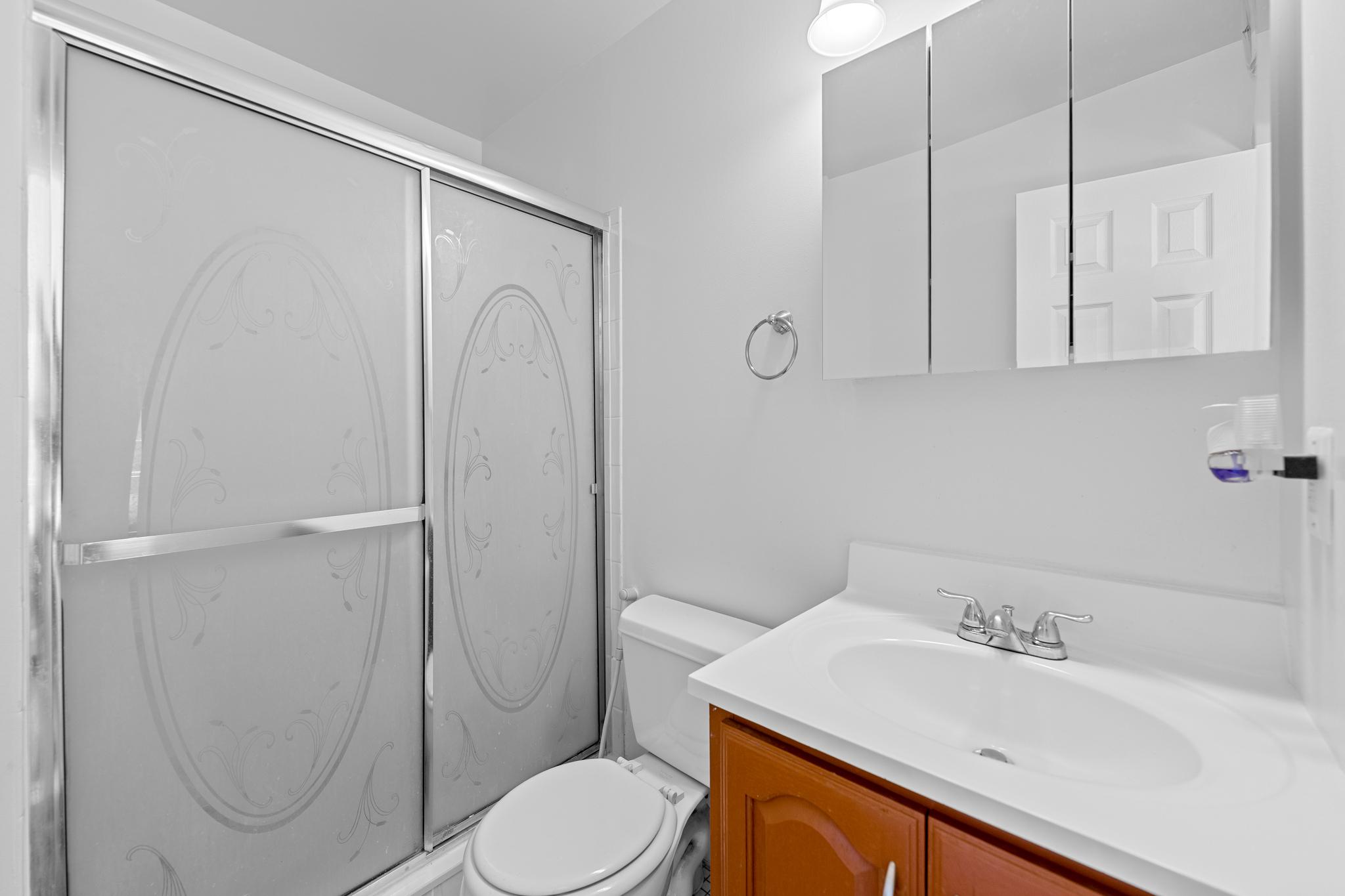 2829 Grovemore Lane Vienna, VA 22180 - Photo 7 of 42 Modern main bathroom with sleek finishes.