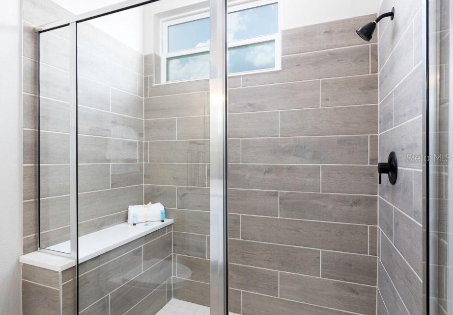 2116 Broome Street Kissimmee, FL 34743 - Photo 10 of 16 a bathroom with a shower