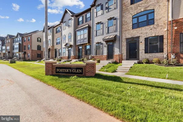 a view of a building with a yard