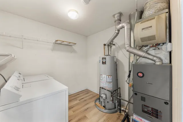 a view of storage and utility room with racks on the wall