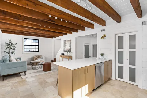 a view of kitchen with furniture and window