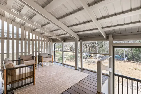 a view of a living room with furniture
