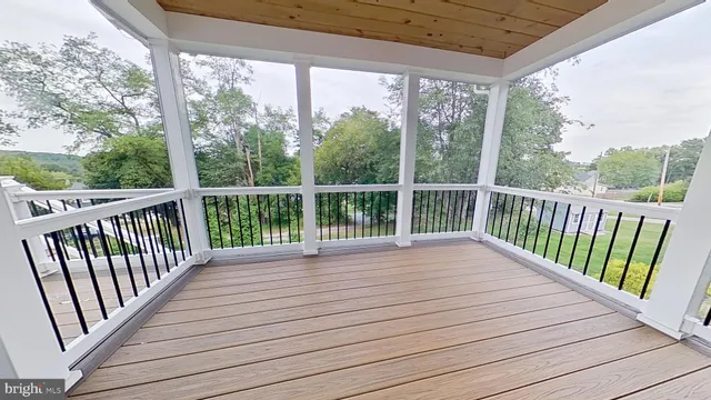 a view of outdoor space with deck and balcony