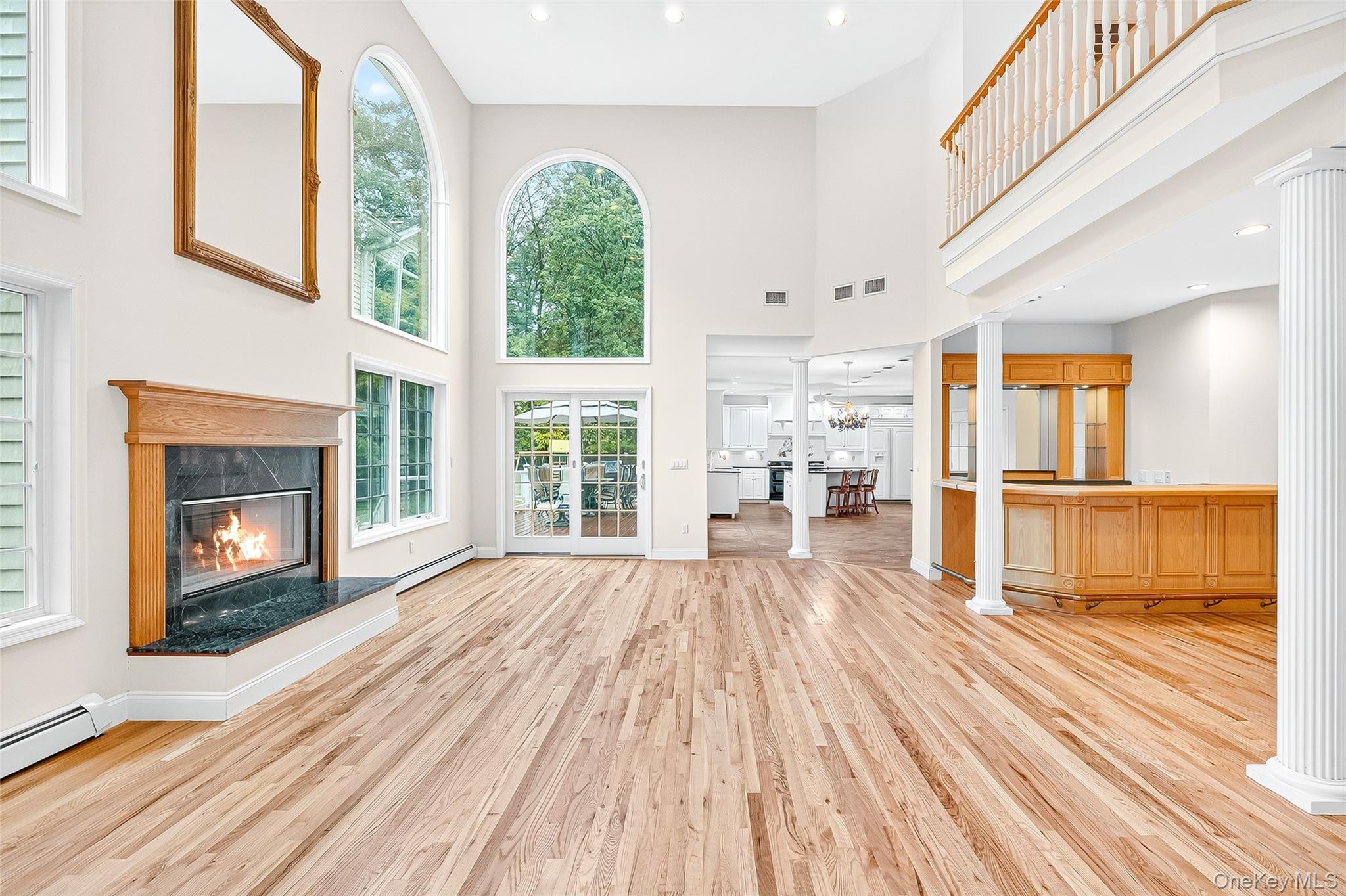 21 Bensons Point Court Stony Point, NY 10980 - Photo 15 of 50 a view of empty room with wooden floor and fireplace