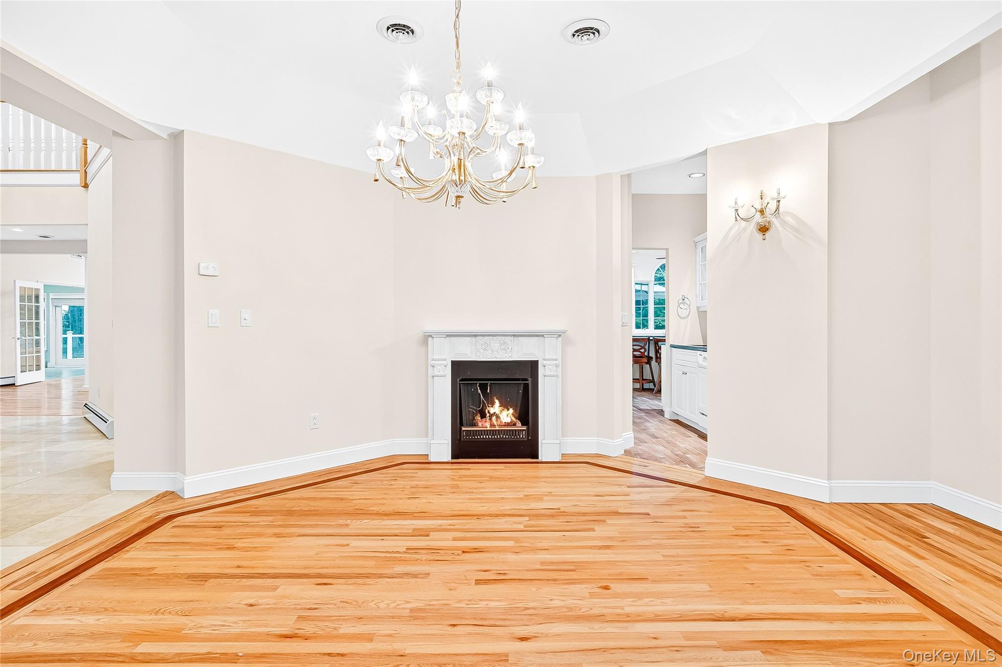 21 Bensons Point Court Stony Point, NY 10980 - Photo 22 of 50 a view of an empty room with a chandelier