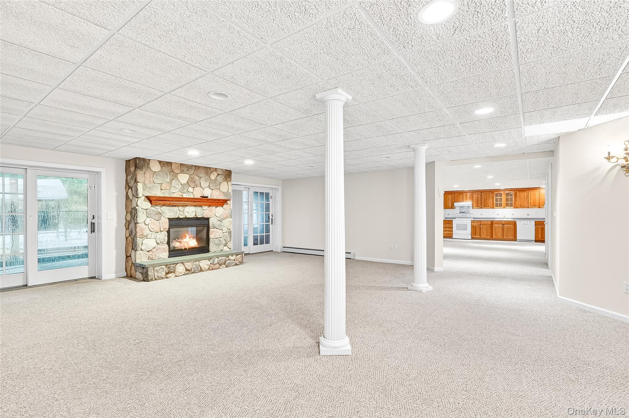 21 Bensons Point Court Stony Point, NY 10980 - Photo 39 of 50 a view of an empty room with a fireplace and a window