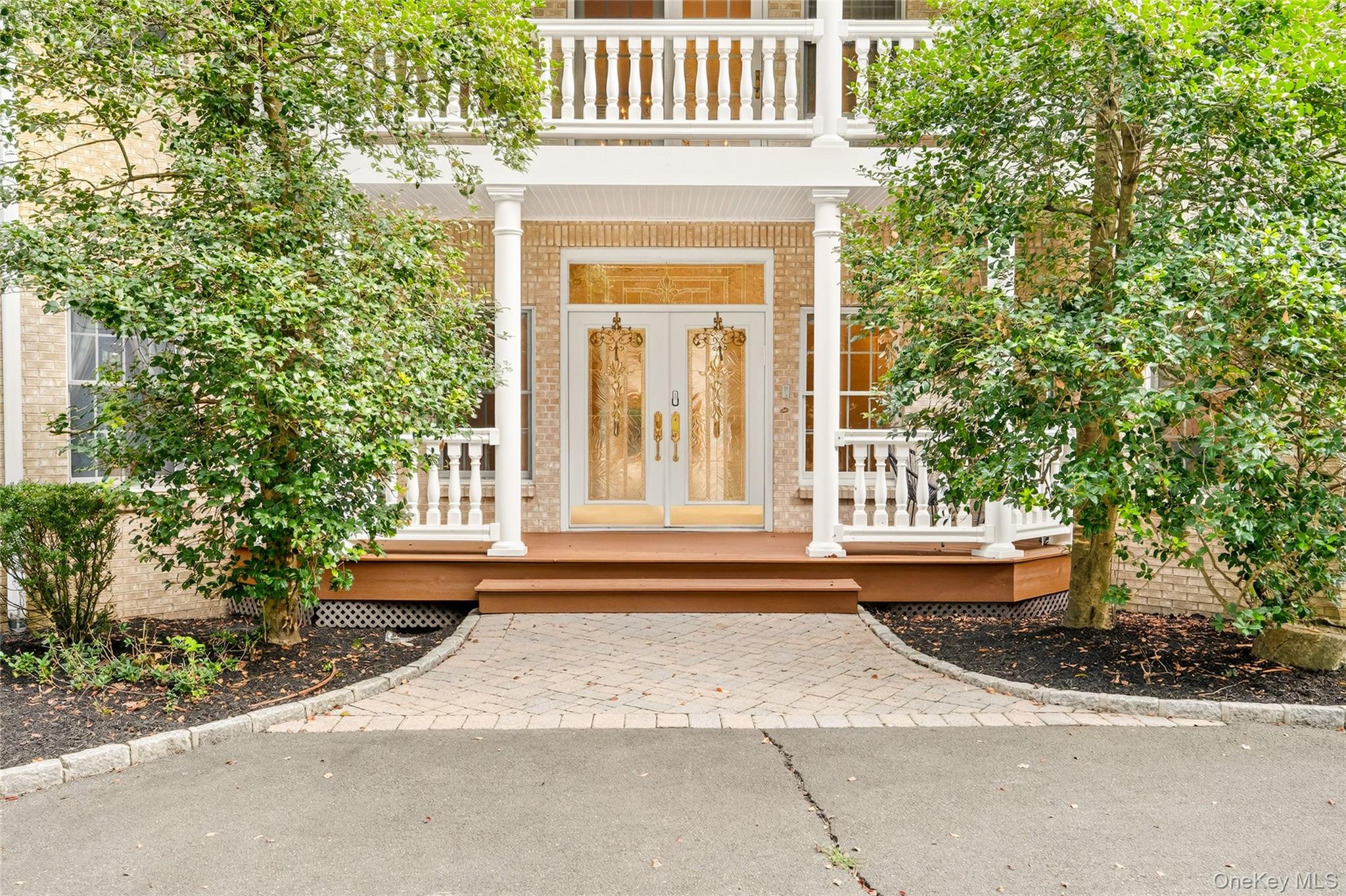 21 Bensons Point Court Stony Point, NY 10980 - Photo 5 of 50 a front view of a house with a garden