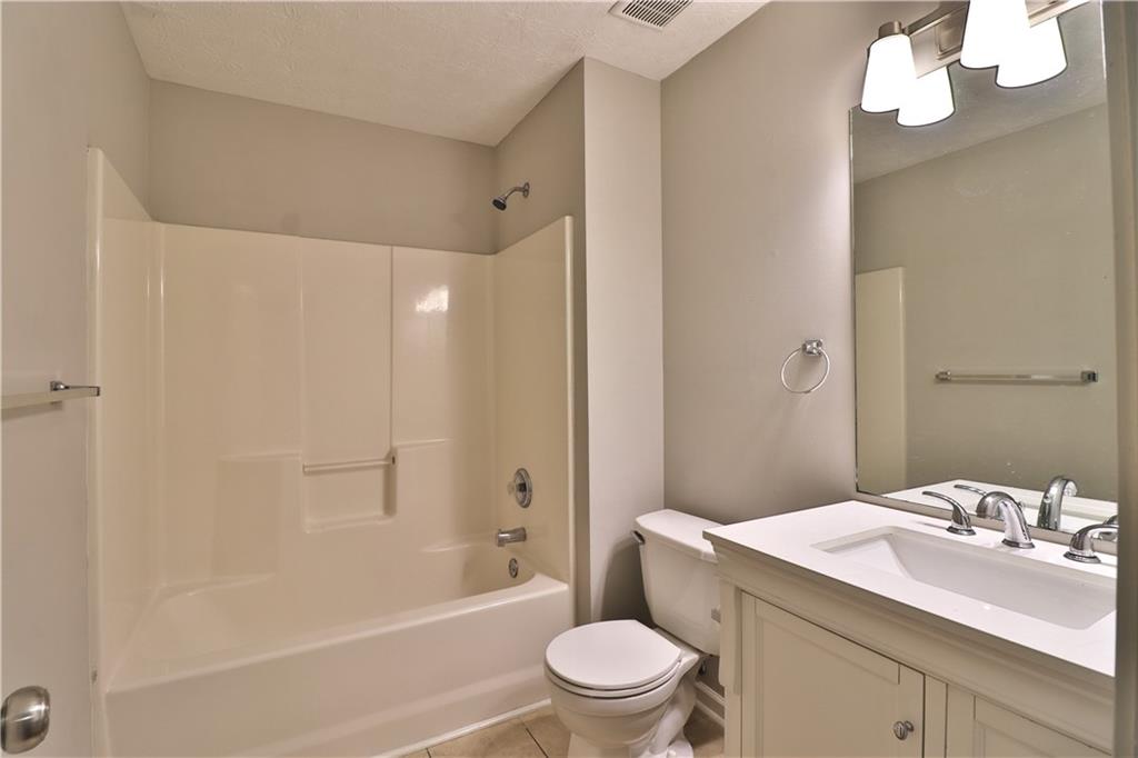 353 Fall View Court Winder, GA 30680 - Photo 55 of 61 a bathroom with a sink a toilet and shower