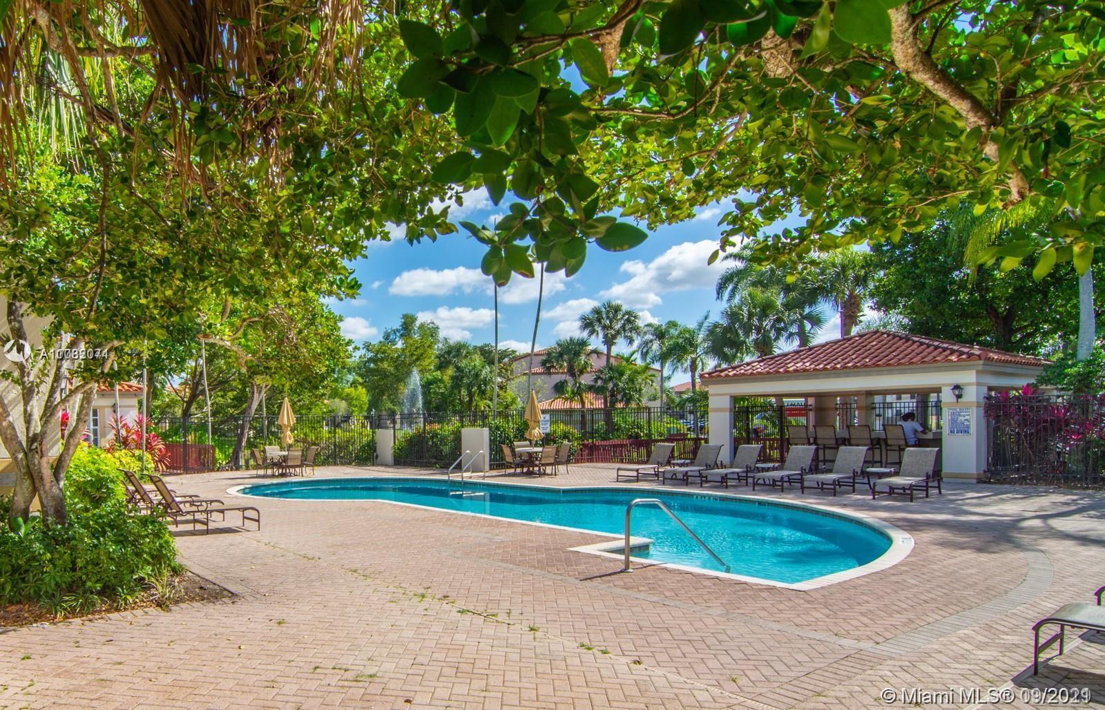 Welleby Sunrise, FL 33351 - Photo 3 of 9 a view of a swimming pool with a yard