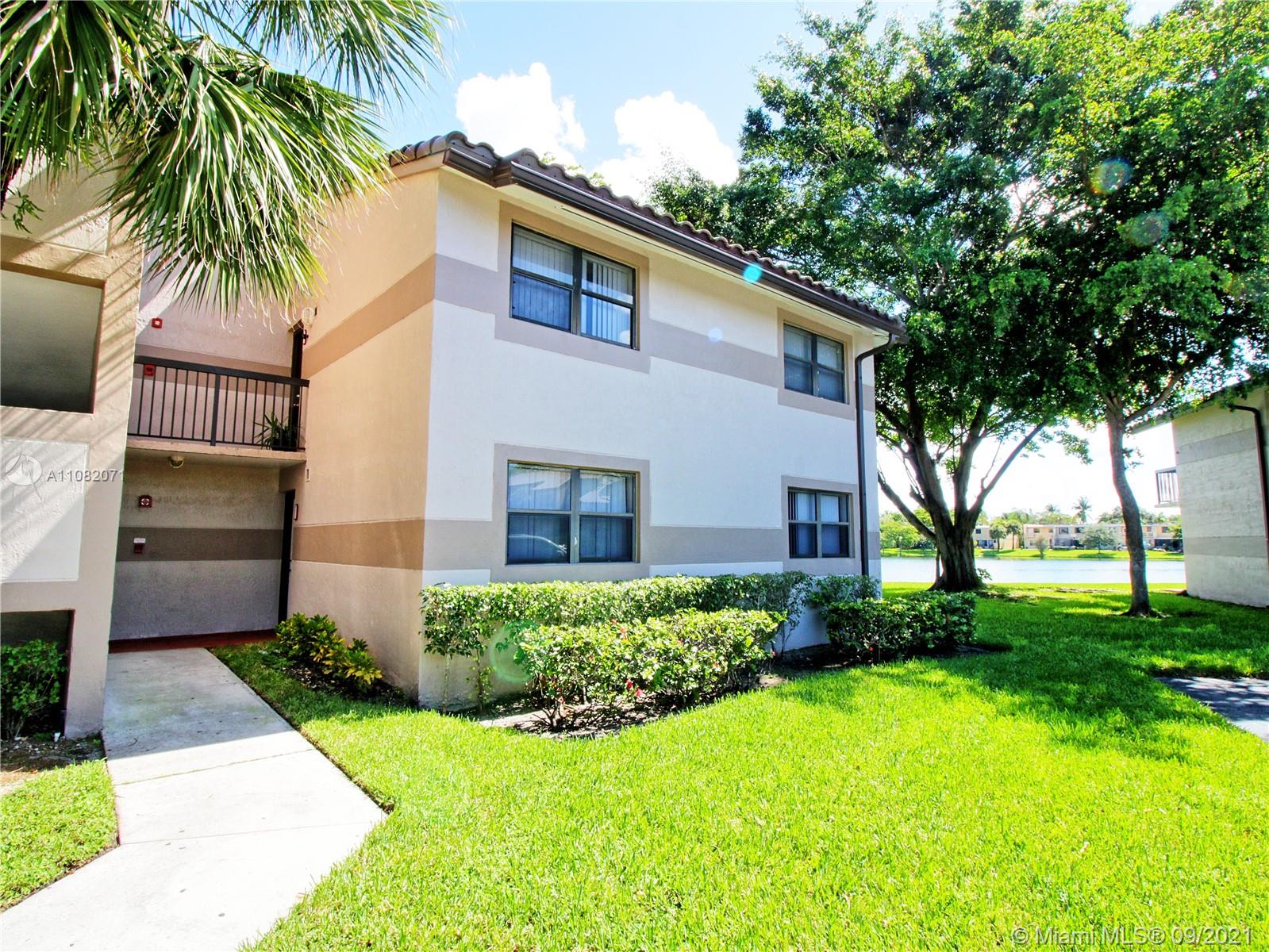 Welleby Sunrise, FL 33351 - Photo 4 of 9 a front view of house with yard and green space
