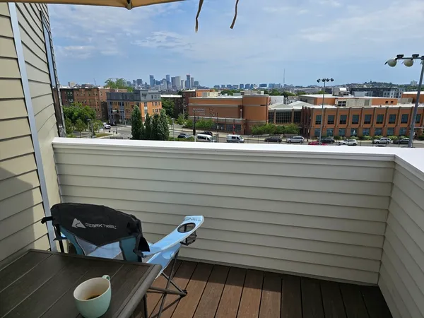 a view of a chairs and table in a terrace