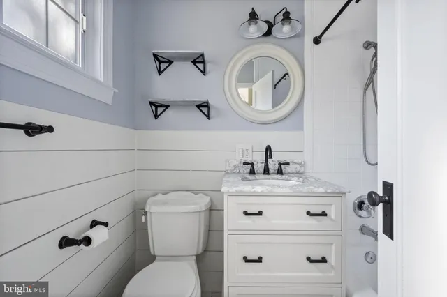 a bathroom with a sink and a toilet