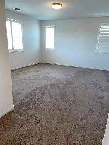 a view of an empty walk in closet