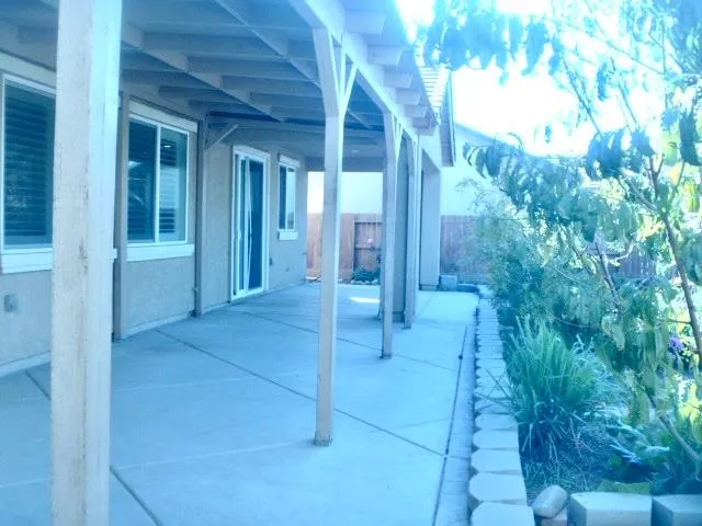 a view of backyard with green space