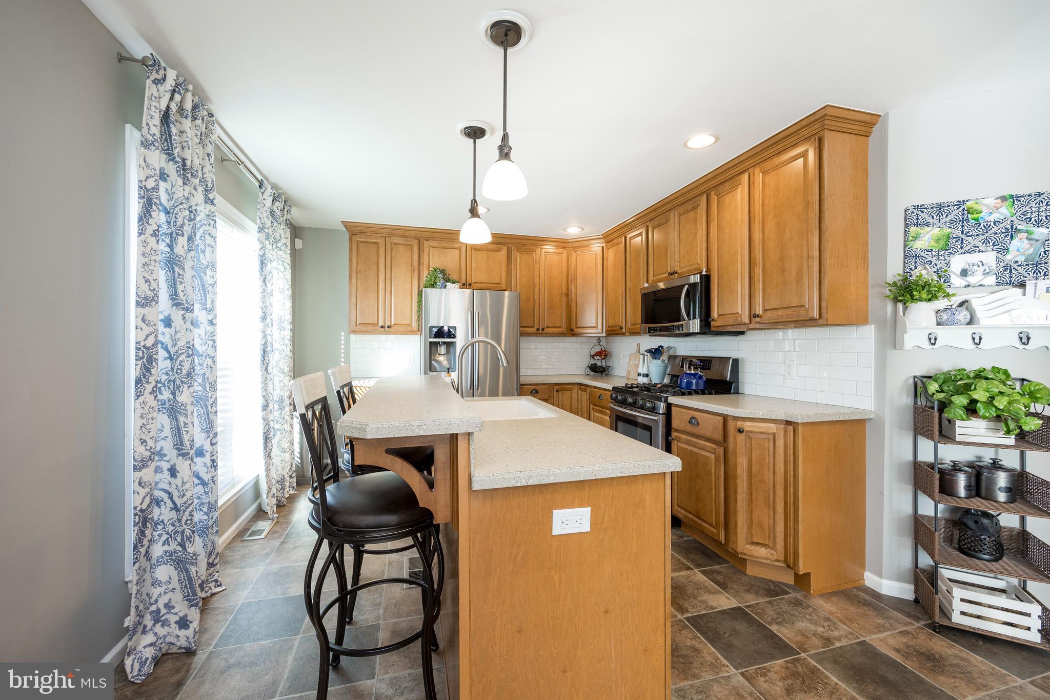 5 Raleigh Court Pottstown, PA 19464 - Photo 15 of 58 Kitchen with large island, seating and sink.