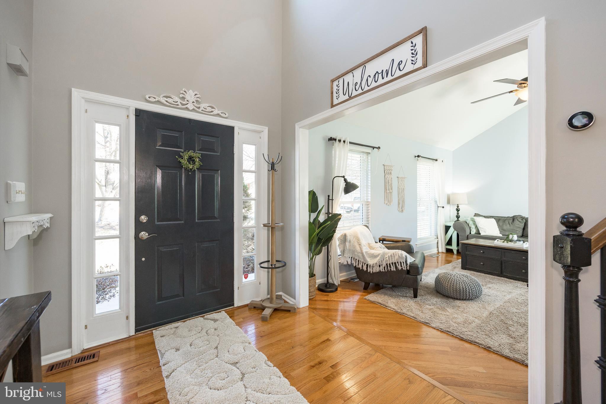View of Main Hall Door & Living Room