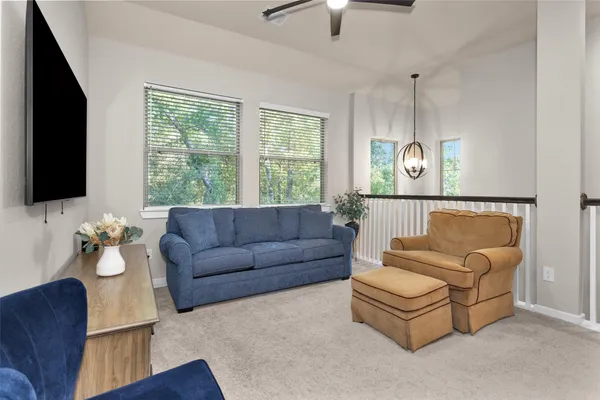 a bedroom with a bed and a cabinets