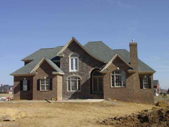 5622 Cape Fox Drive Oak Ridge, NC 27310 - Photo 1 of 4 Exterior Front. Front Elevation