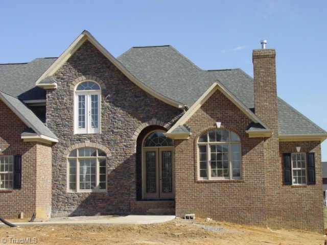 5622 Cape Fox Drive Oak Ridge, NC 27310 - Photo 2 of 4 Other. Stone Work on Front Elevation