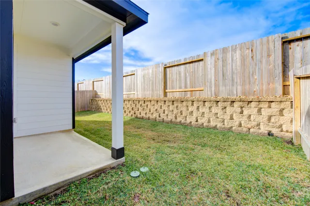 a view of a backyard with a garden