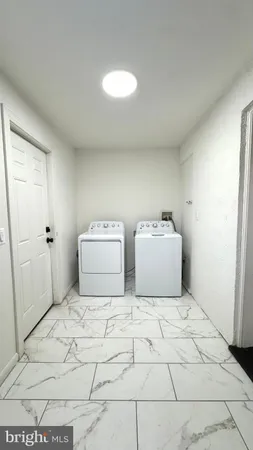 a bedroom with a bed and a shower