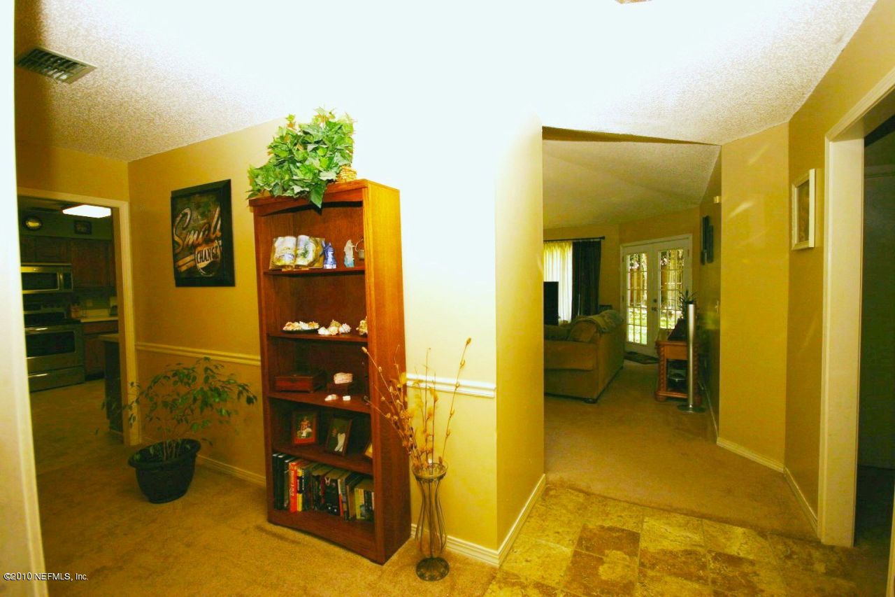 3125 Nautilus Road Middleburg, FL 32068 - Photo 3 of 23 a bathroom with a shower