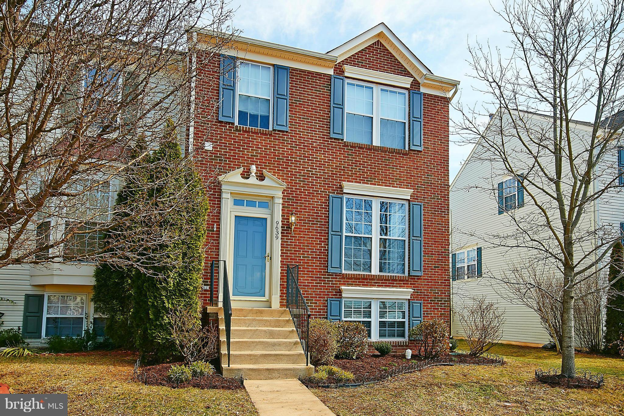 9639 Innerwick Place Bristow, VA 20136 - Photo 1 of 29 a front view of a house with a yard