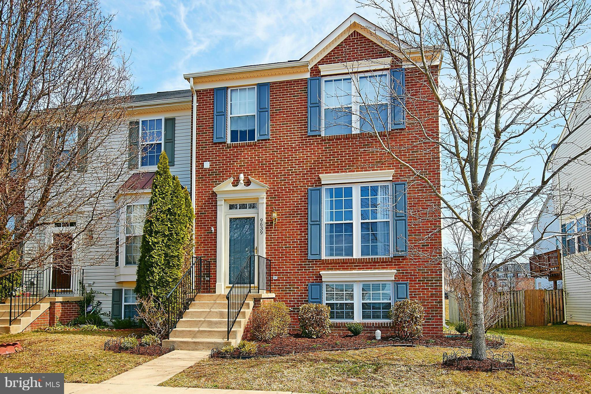 9639 Innerwick Place Bristow, VA 20136 - Photo 2 of 29 a front view of a house with garden