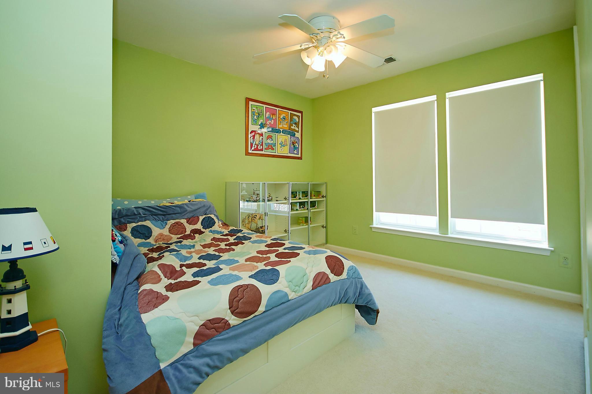 9639 Innerwick Place Bristow, VA 20136 - Photo 19 of 29 a bedroom with a bed and a window