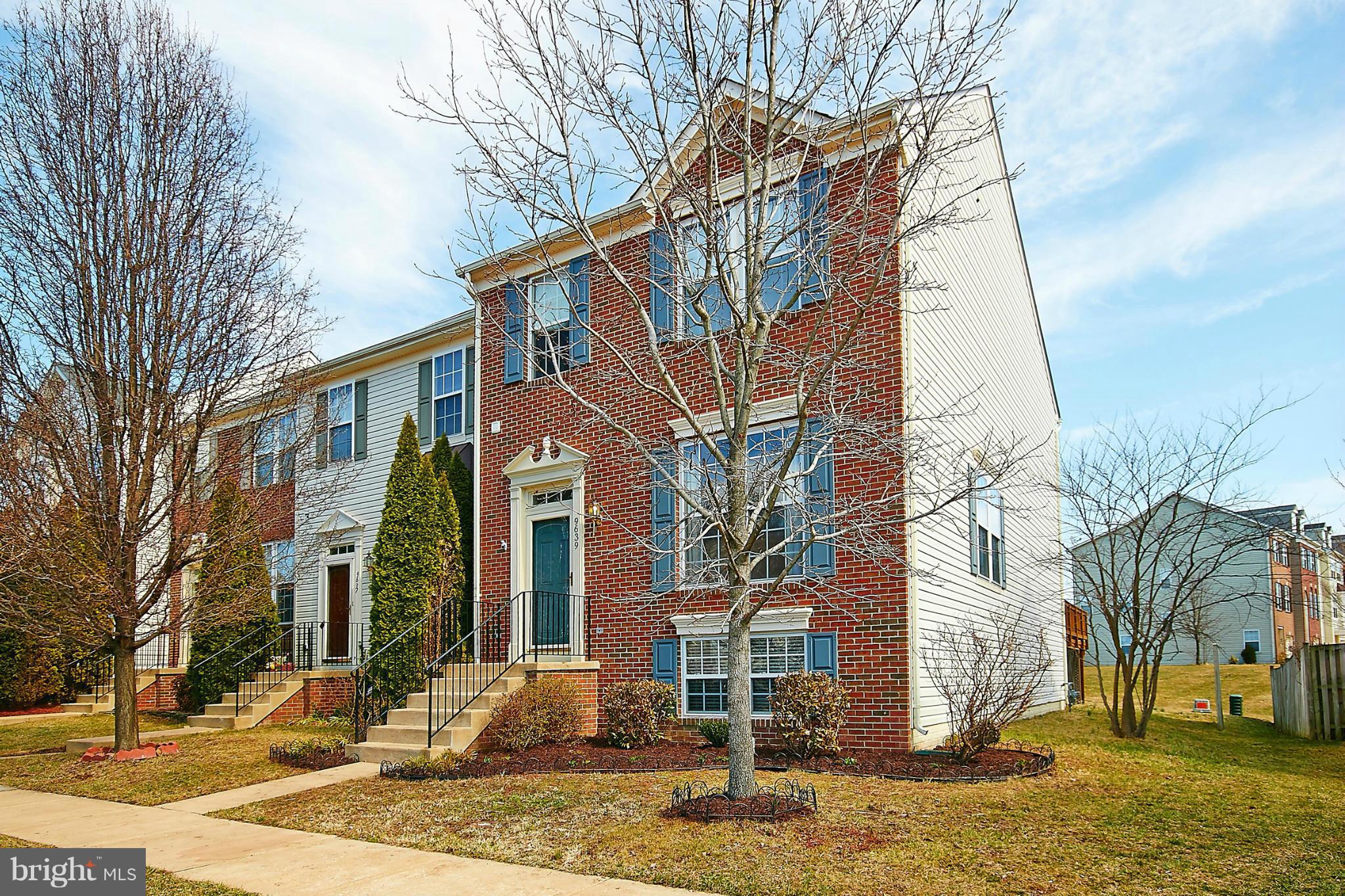 9639 Innerwick Place Bristow, VA 20136 - Photo 3 of 29 a street view along with residential houses