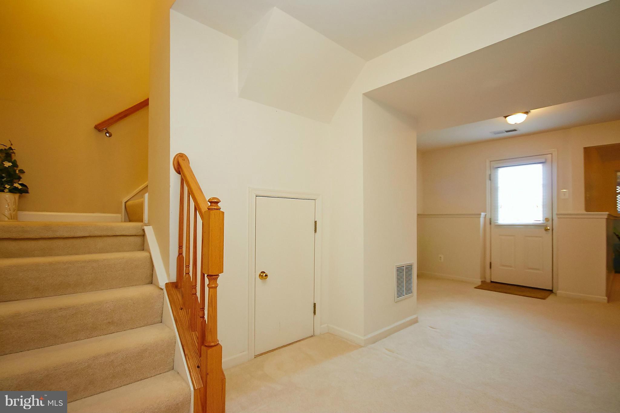 9639 Innerwick Place Bristow, VA 20136 - Photo 22 of 29 a view of an empty room with stairs