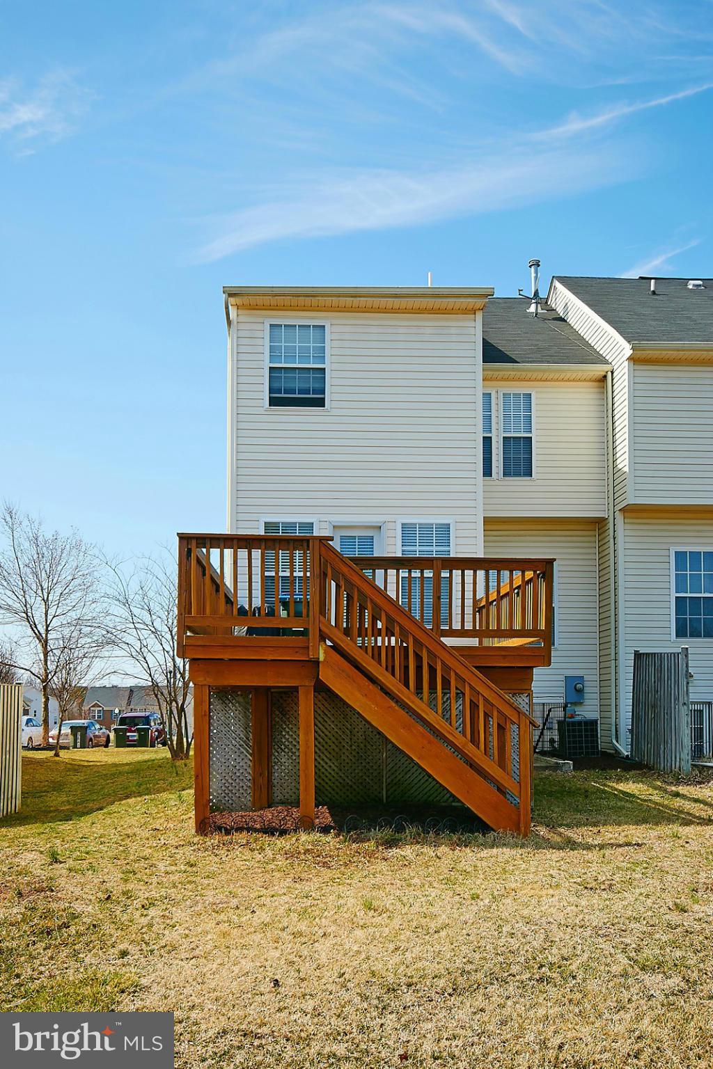 9639 Innerwick Place Bristow, VA 20136 - Photo 28 of 29 a view of a house with wooden fence