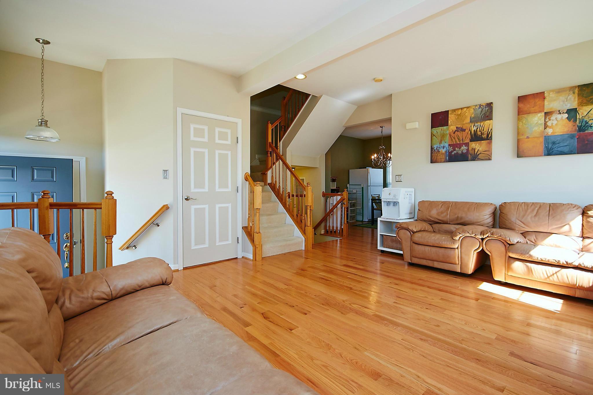9639 Innerwick Place Bristow, VA 20136 - Photo 6 of 29 a living room with furniture and stairs
