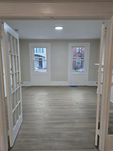 a view of an empty room with a window