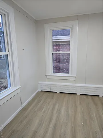 a view of a window in an empty room