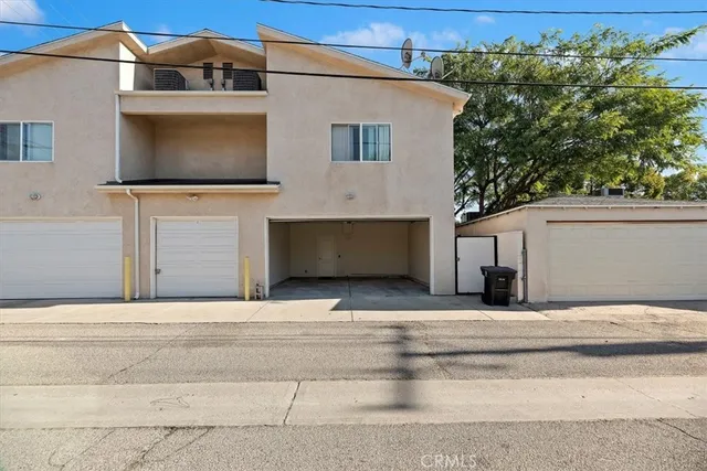 a front view of a house with a garage