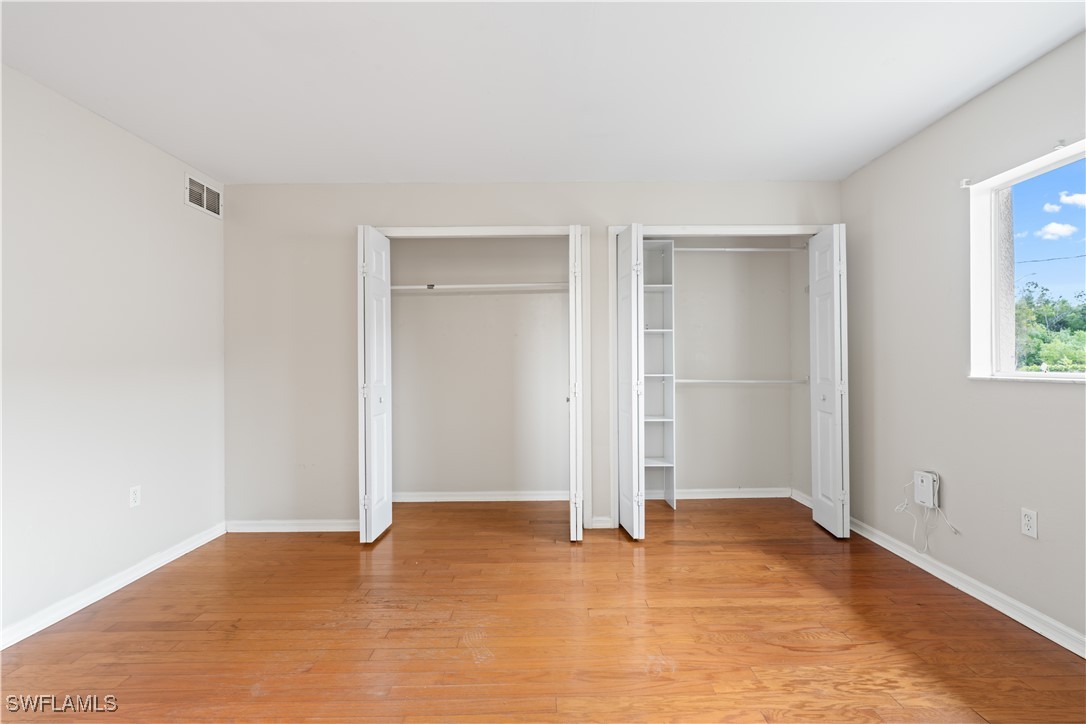 209 Meadow Road Lehigh Acres, FL 33973 - Photo 12 of 48 a view of an empty room